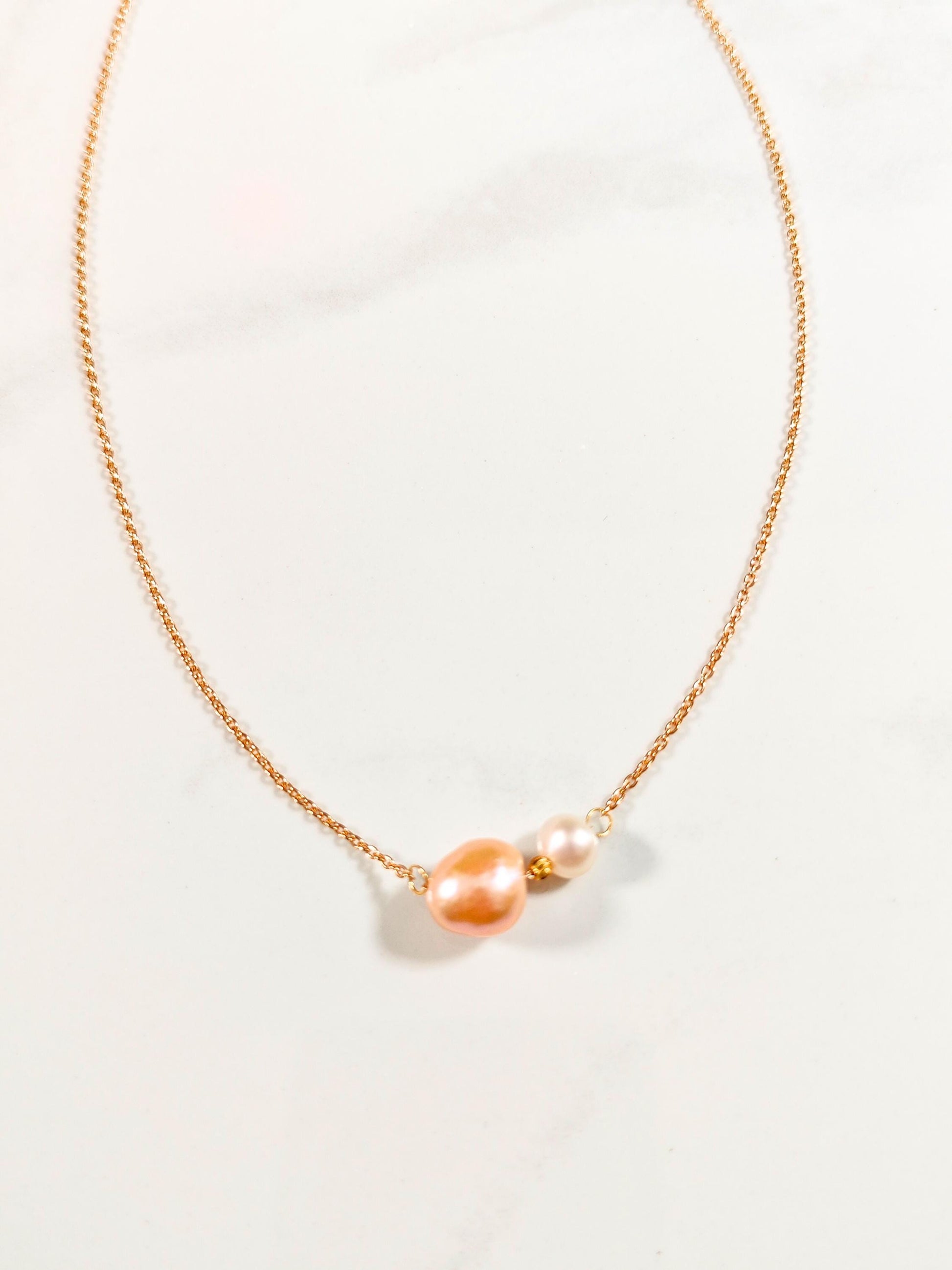 Pearl necklace on a light background