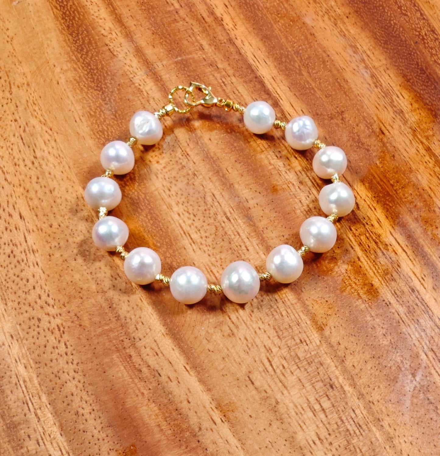 Pearl bracelet on a wooden surface